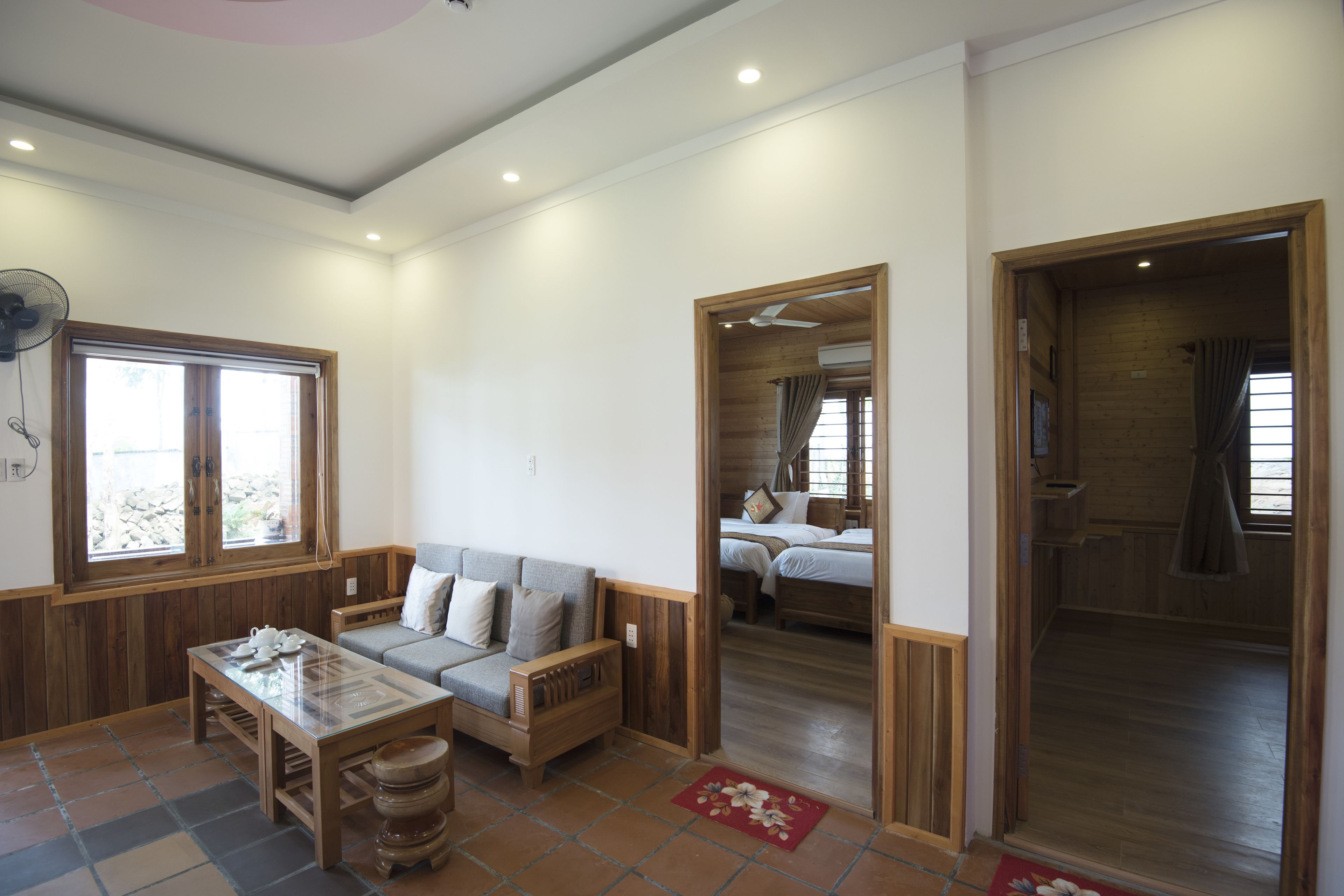 Family Apartment, 2 Bedrooms, Garden View | Living room | 32-inch LCD TV with cable channels, TV