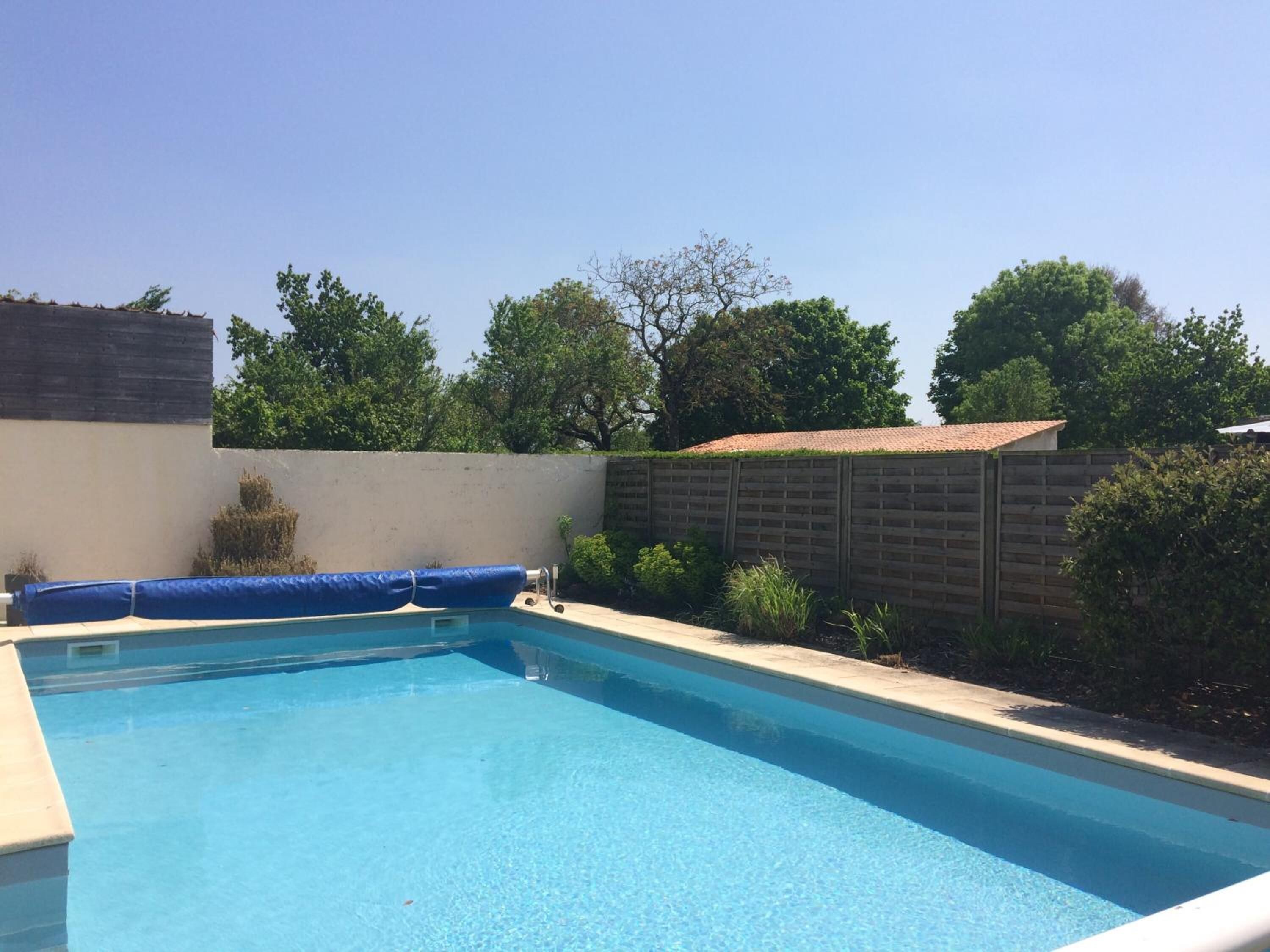 Outdoor pool, open 2:00 PM to 7:30 PM, pool umbrellas, sun loungers