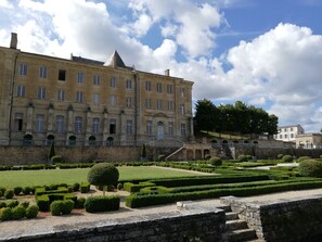 A historic building with a symmetrical facade, large windows, and a central tower. - Les Chenêts (Chenay)