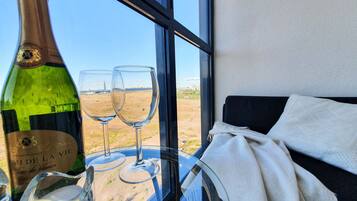 Appartement Deluxe, 1 chambre, cuisine, en front de plage | Terrasse/Patio