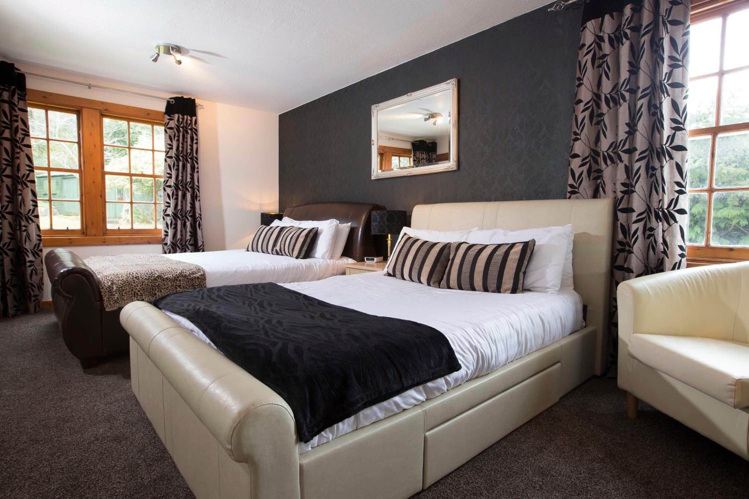 premium bedding, desk, blackout curtains, iron/ironing board