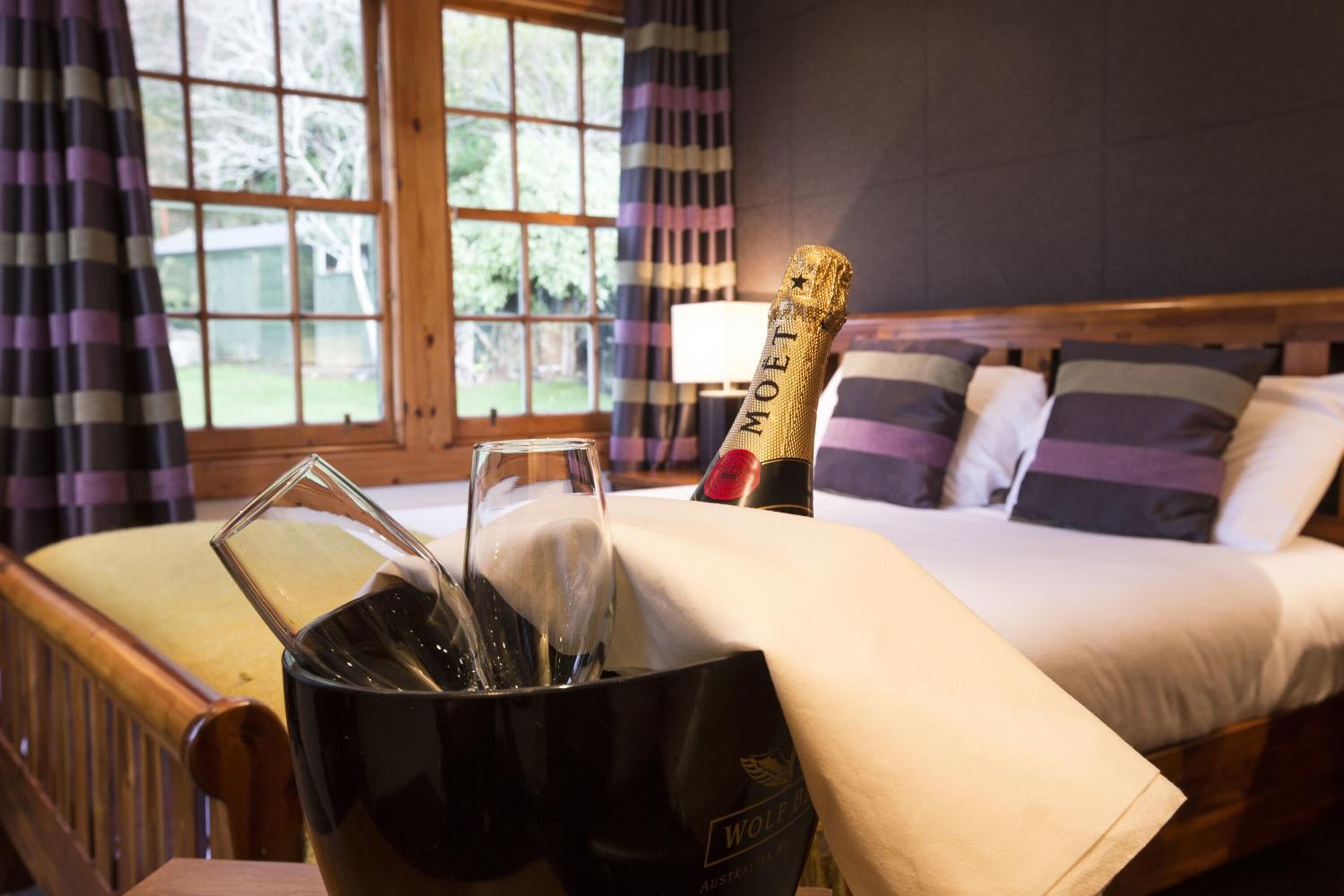 premium bedding, desk, blackout curtains, iron/ironing board