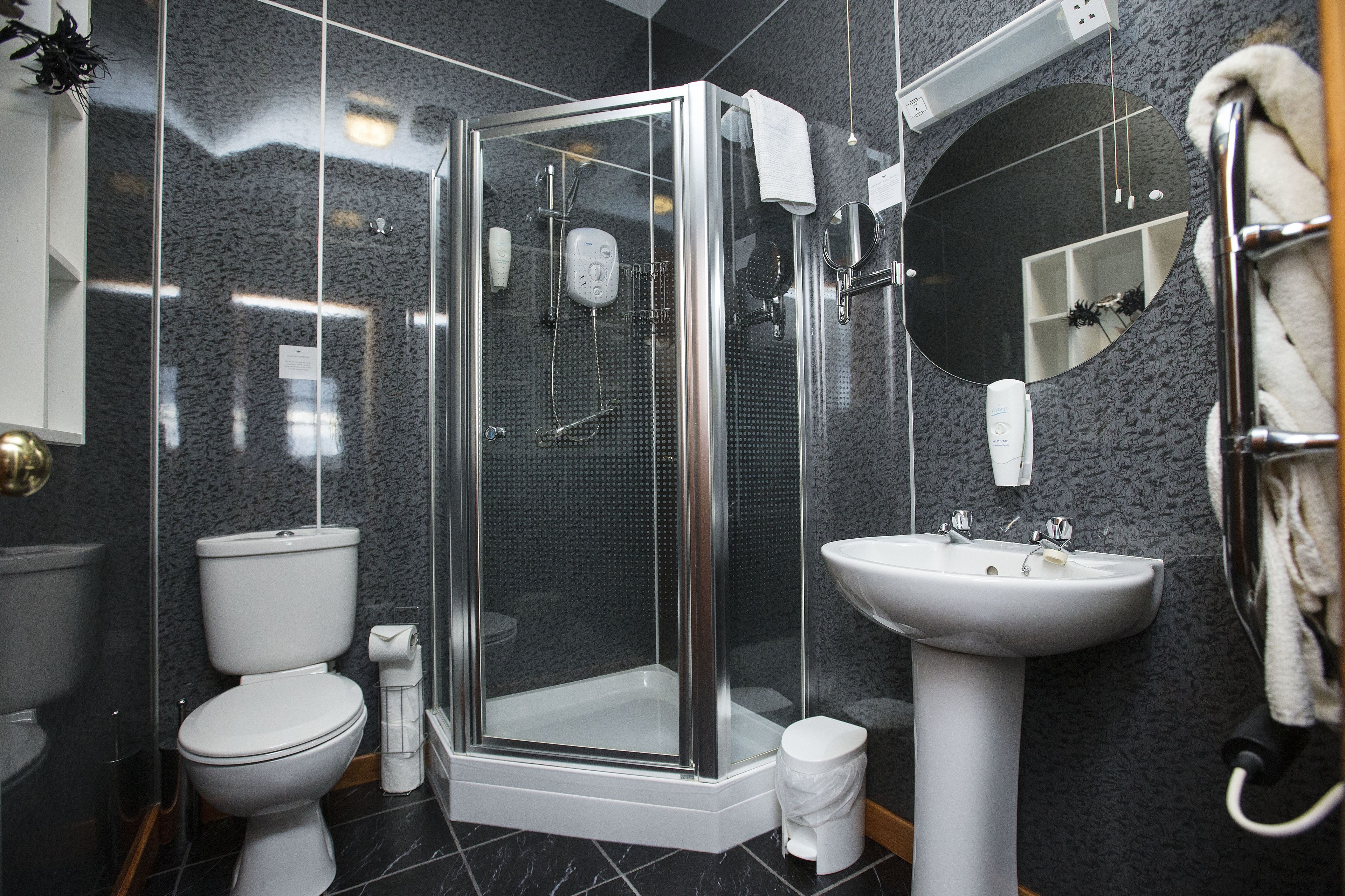 superior triple room | bathroom | shower, free toiletries, hair dryer, towels