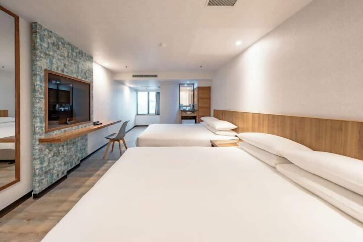 Down comforters, free minibar, in-room safe, desk