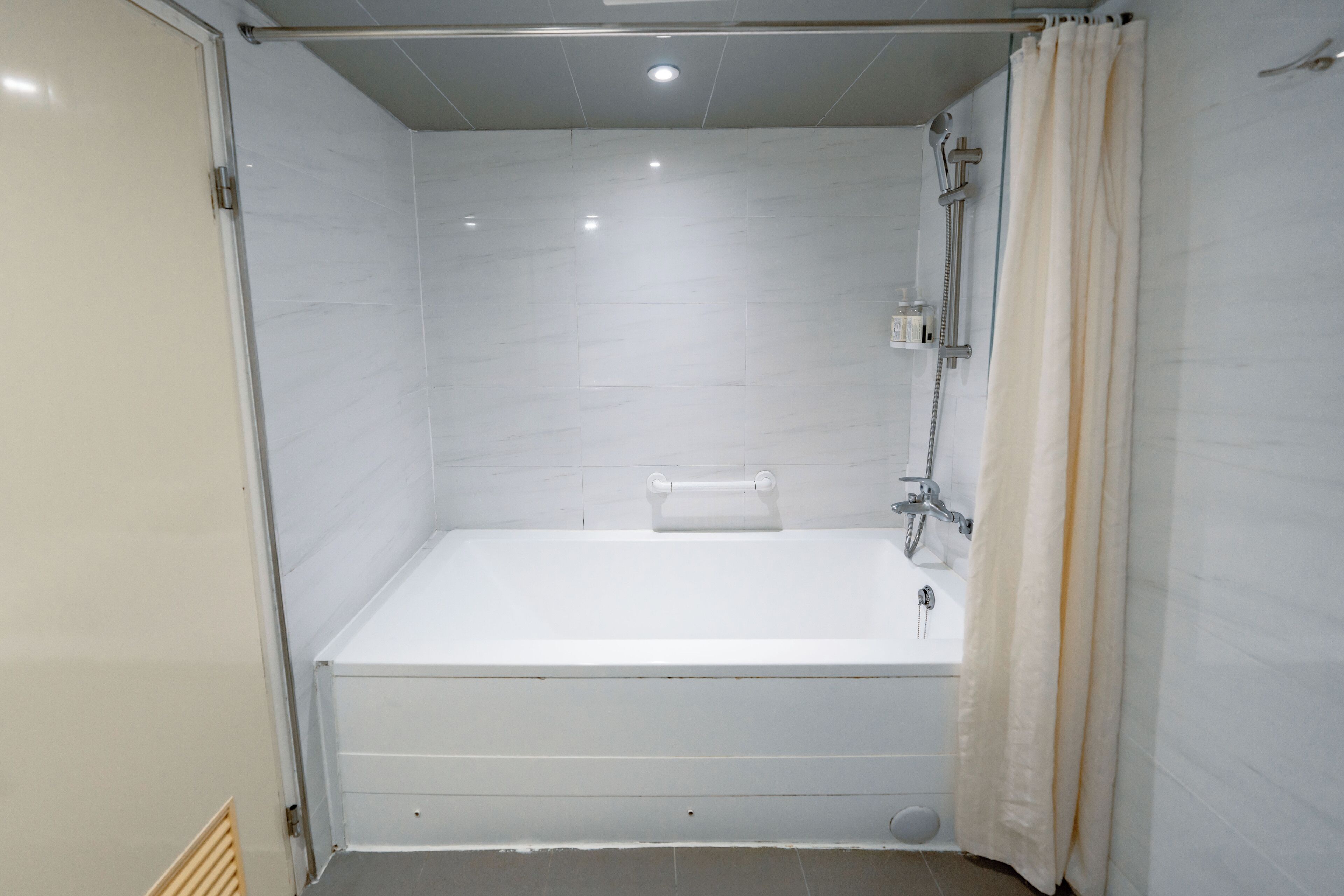 eco-friendly toiletries, hair dryer, towels, shampoo