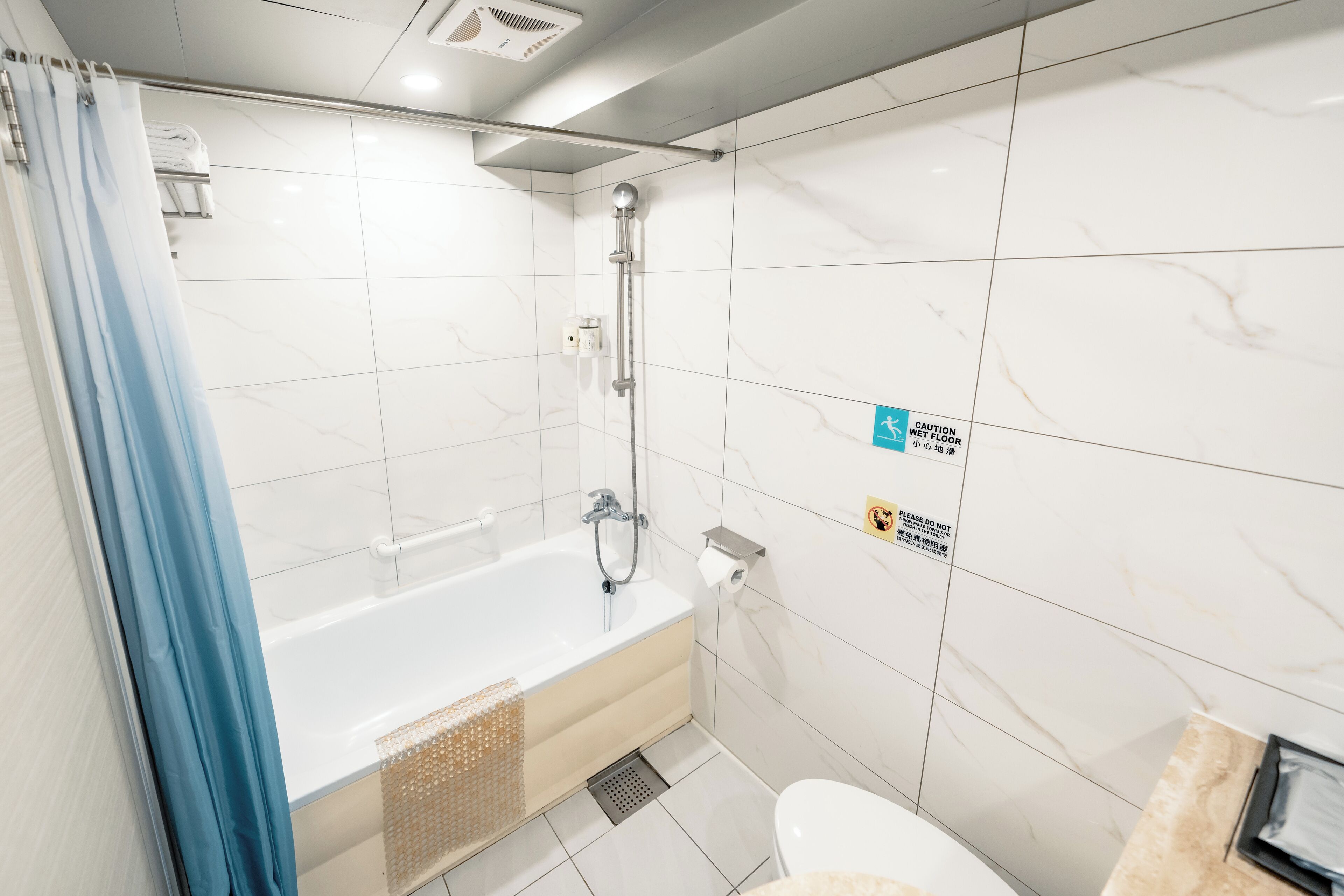 eco-friendly toiletries, hair dryer, towels, shampoo