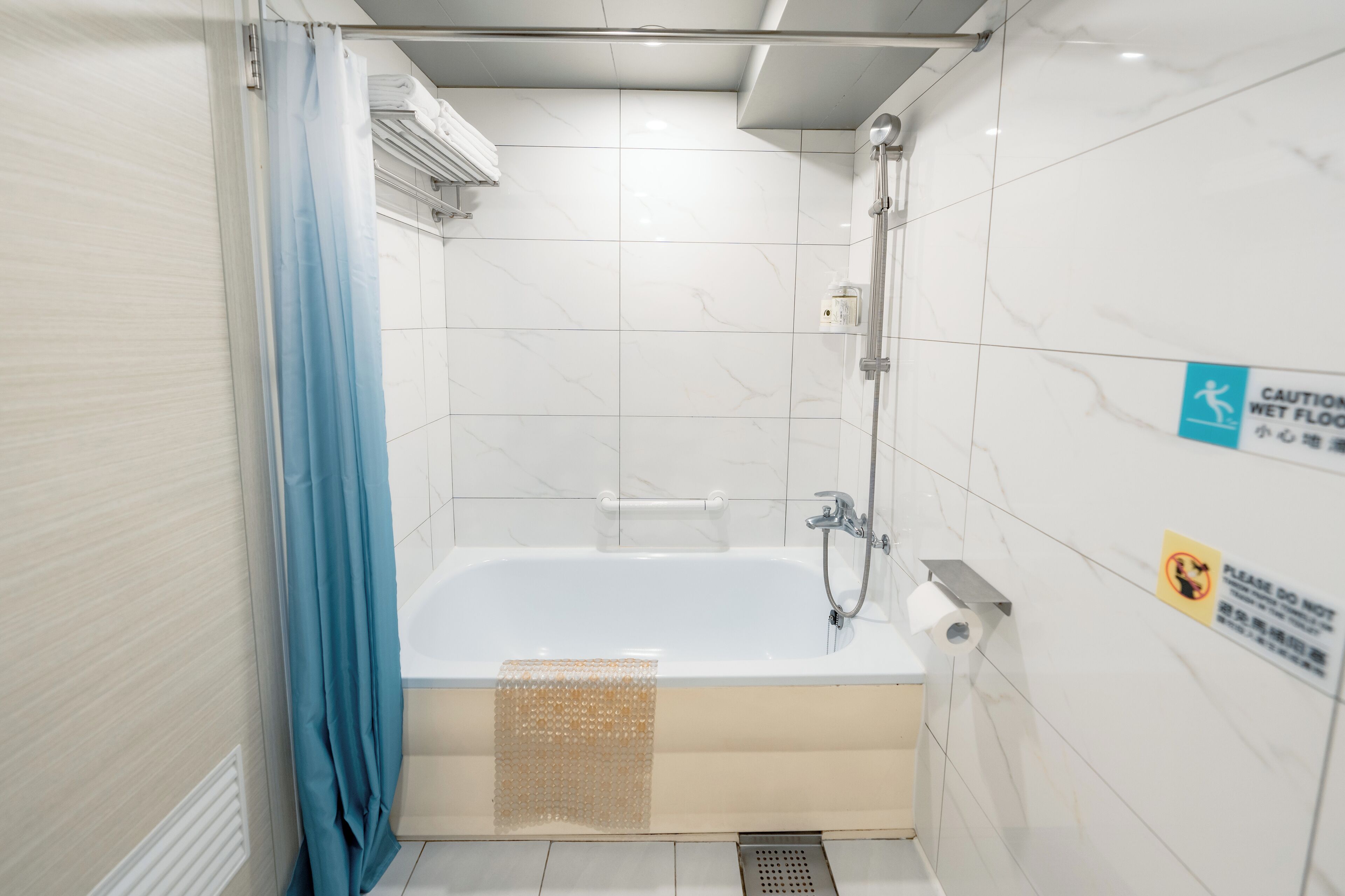 eco-friendly toiletries, hair dryer, towels, shampoo