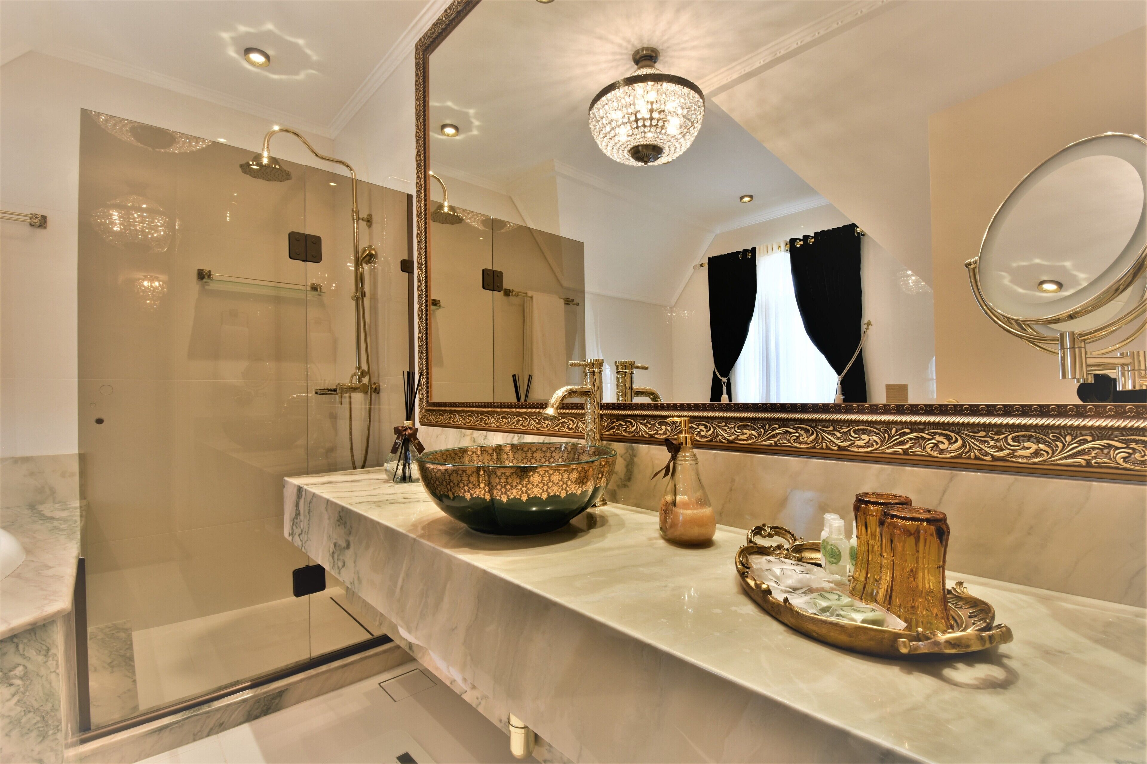 deluxe suite, jetted tub (majestic) | bathroom | shower, designer toiletries, hair dryer, bathrobes