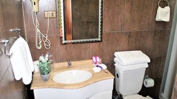 Shower, free toiletries, hair dryer, towels