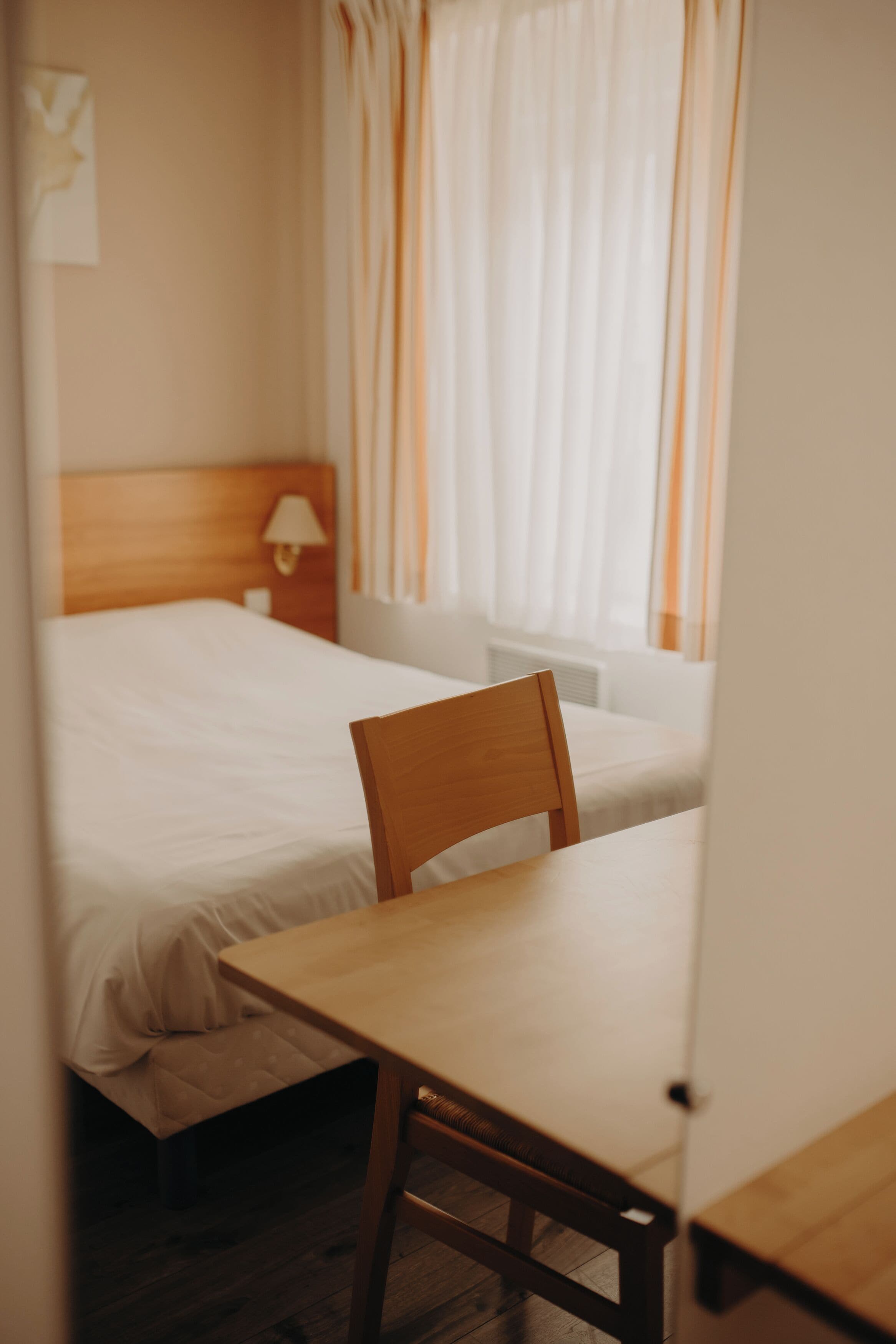 economy room | in-room safe, desk, soundproofing, iron/ironing board