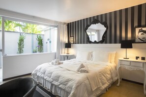 Suite Luxo | Minibar, tende oscuranti, Wi-Fi gratuito, lenzuola