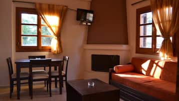 Flat-screen TV, fireplace