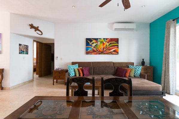 Condo, 2 Bedrooms | Living room | Flat-screen TV
