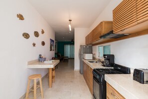 Condo, 2 Bedrooms | Private kitchen | Fridge, microwave, coffee/tea maker, cookware/dishes/utensils