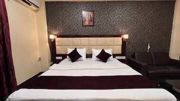 Habitación Premium, 1 cama de matrimonio grande | 1 dormitorio, caja fuerte, wifi gratis y ropa de cama