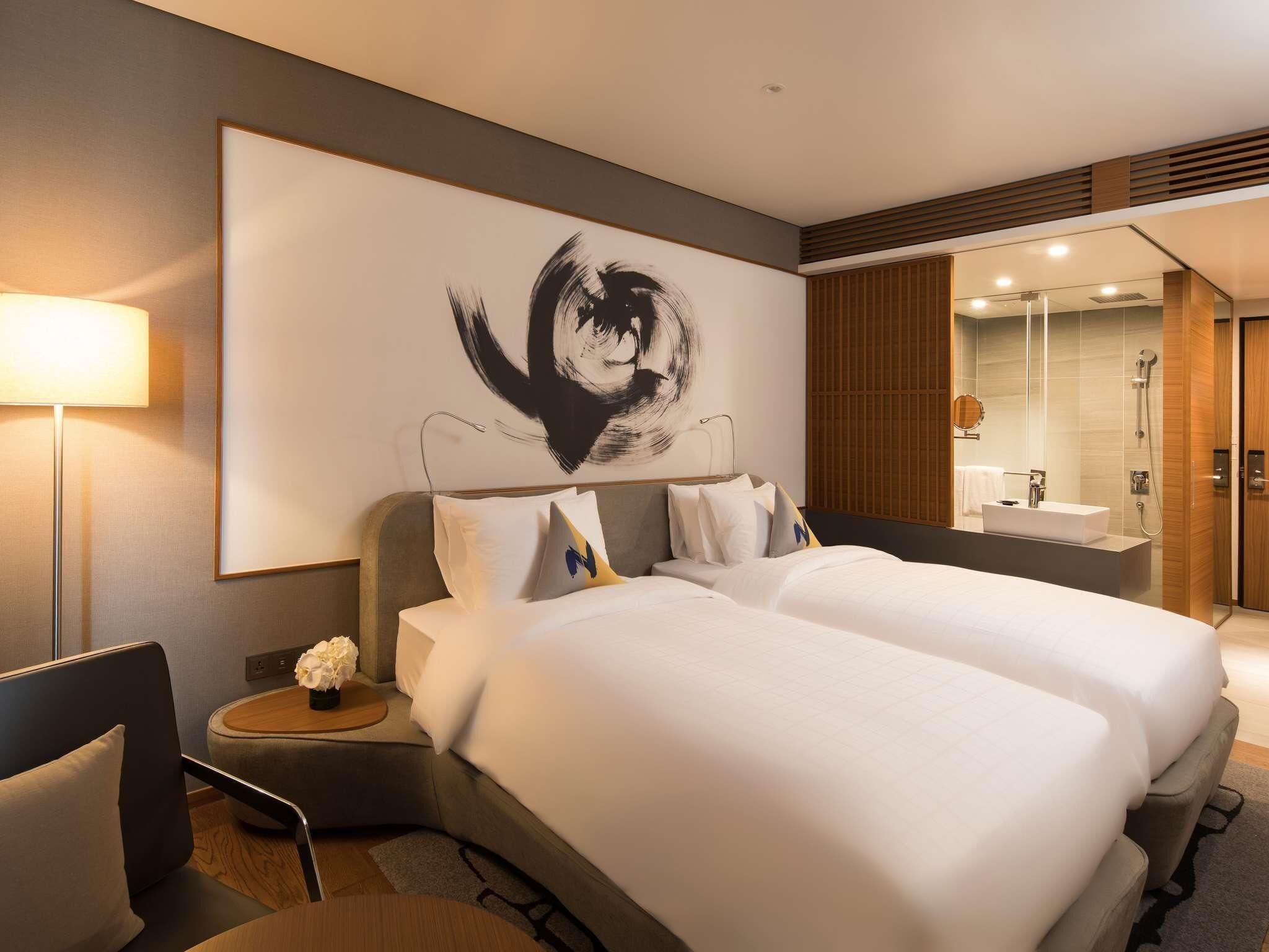 Habitación ejecutiva, 2 camas individuales | Ropa de cama de alta calidad, edredón y minibar 