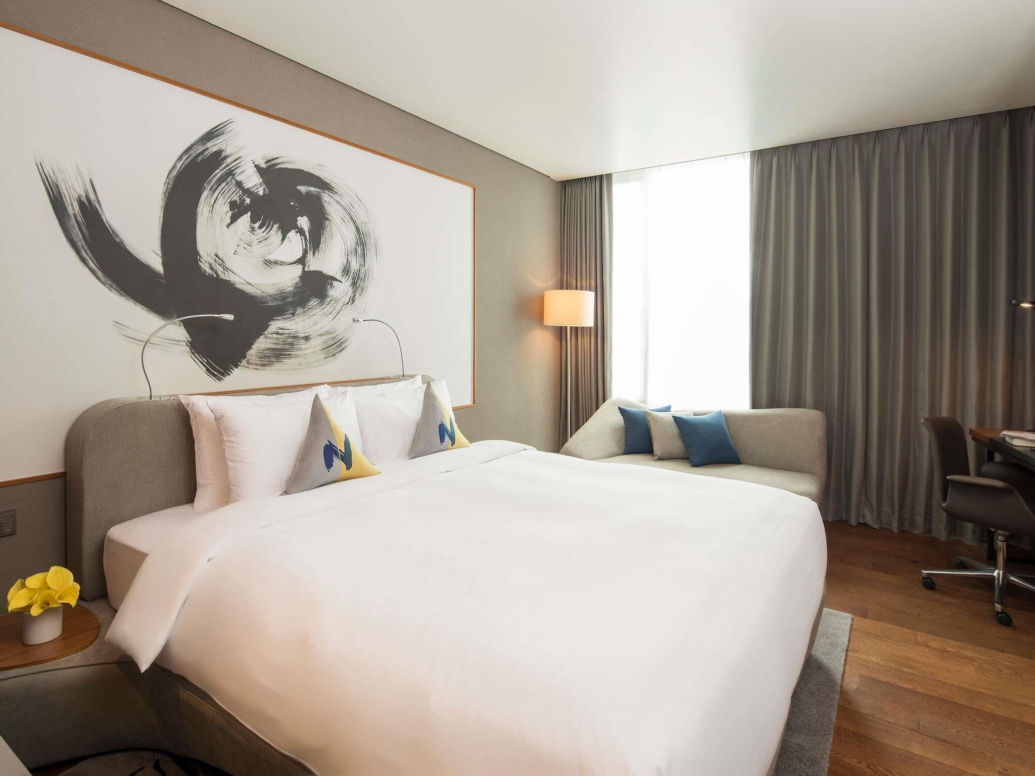 Habitación superior, 1 cama matrimonial | Ropa de cama de alta calidad, edredón y minibar 