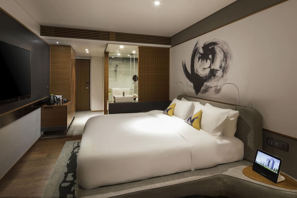 Habitación ejecutiva, 1 cama matrimonial | Ropa de cama de alta calidad, edredón y minibar