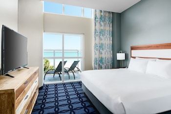 In-room safe, desk, blackout drapes, iron/ironing board at Homewood Suites by Hilton Myrtle Beach Oceanfront