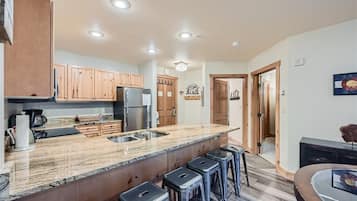Condo, 2 Bedrooms | Private kitchen | Fridge, microwave, oven, dishwasher
