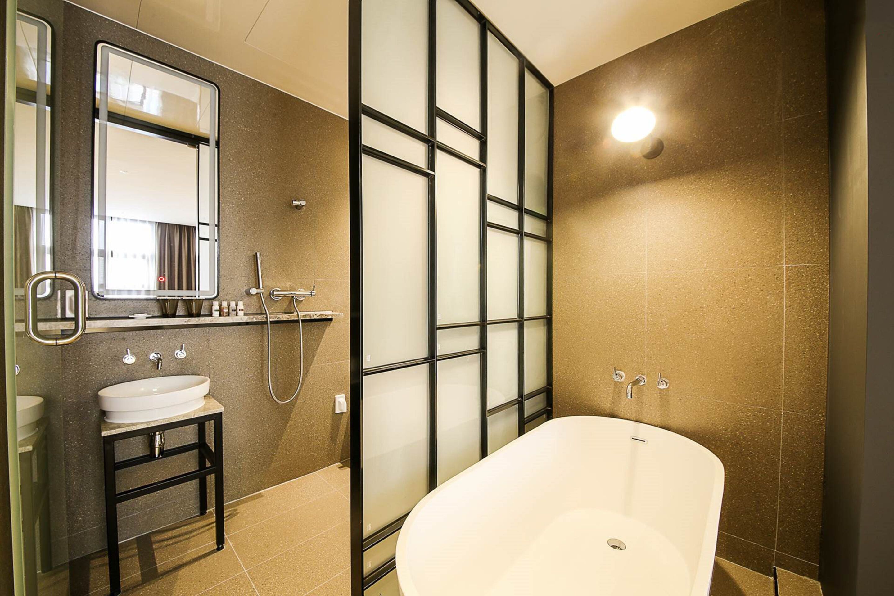 standard double | bathroom | separate bathtub and shower, deep-soaking bathtub, hair dryer, bathrobes