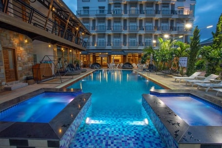 Outdoor pool, pool umbrellas, sun loungers