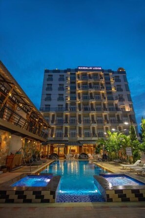 Outdoor pool, pool umbrellas, sun loungers