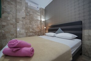 Deluxe Room | Desk, free WiFi, bed sheets - Wisma Asia Busindo Syariah (Bandung)