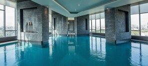 Indoor pool, open 10:00 AM to 8:00 PM, pool loungers, lifeguards on site