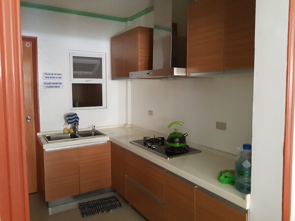 Apartment, 4 Bedrooms | Private kitchenette | Full-size fridge, stovetop, coffee/tea maker, electric kettle - Unit 5 4BR Wanay Transient (Baguio)