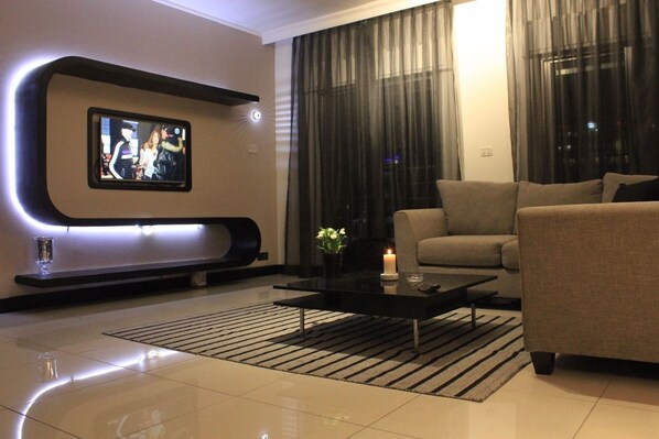 Family Apartment, 2 Bedrooms, Balcony | Living area | Plasma TV, Netflix - Yamsafer Homes 4th Circle (Amman)