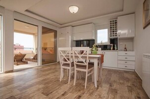 Deluxe Apartment, 1 Bedroom, Sea View | Private kitchen | Fridge, electric kettle