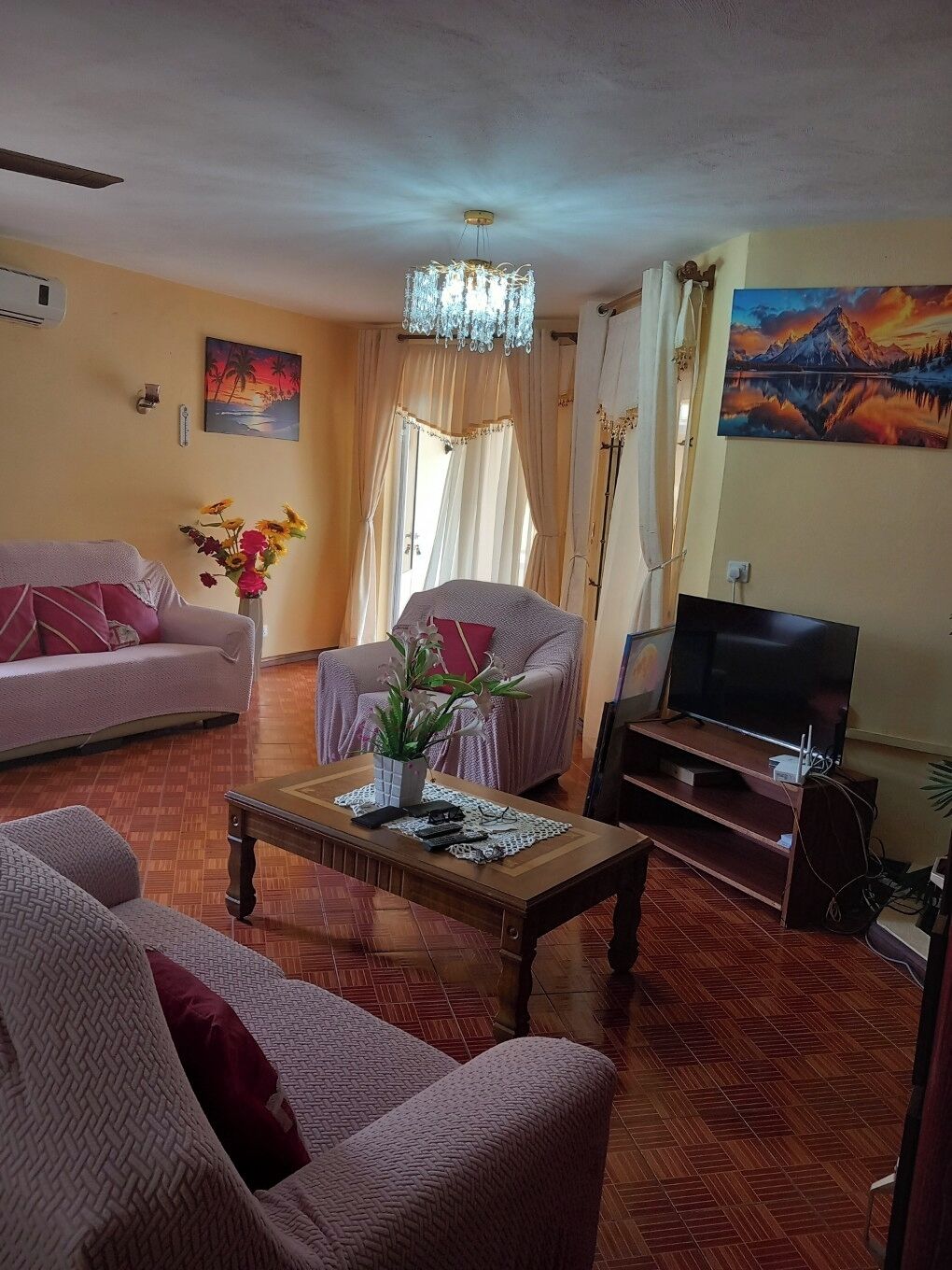 70-inch flat-screen TV with satellite channels, TV, DVD player