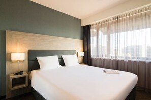 Premium bedding, in-room safe, desk, soundproofing