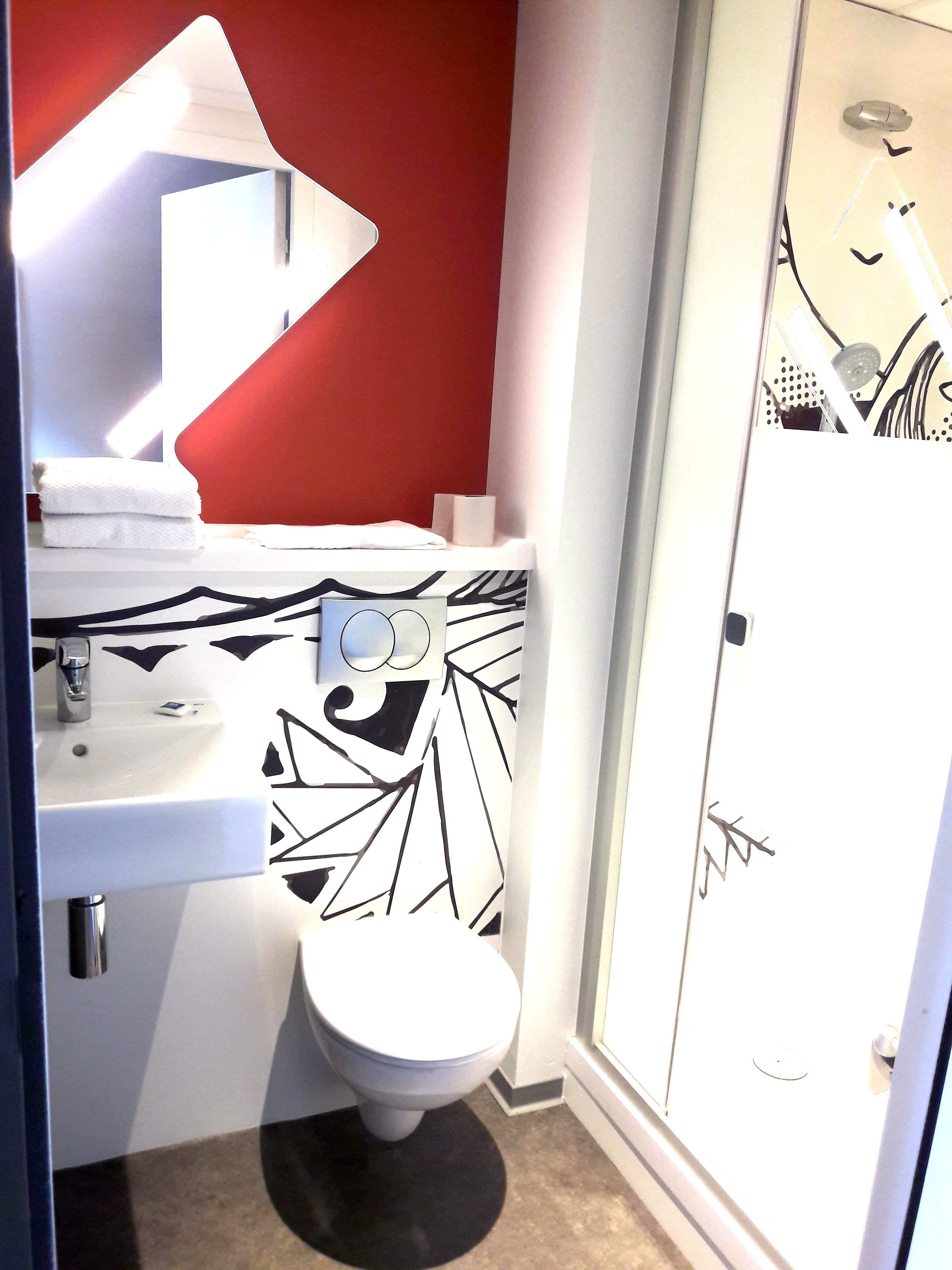 shower, rainfall showerhead, eco-friendly toiletries, towels