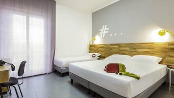 Premium bedding, desk, laptop workspace, soundproofing