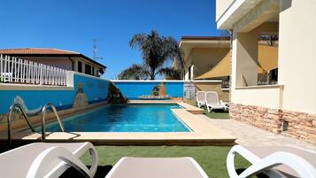 Seasonal outdoor pool, pool umbrellas, sun loungers