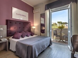 Luxe beddengoed, een minibar, een kluis op de kamer, een bureau