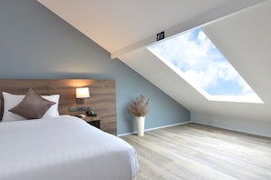 Deluxe Double Bed Room Under Roof Top | Minibar, desk, laptop workspace, free WiFi