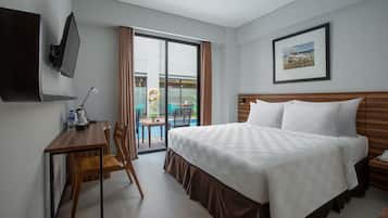 Habitación individual Deluxe | Ropa de cama de alta calidad, minibar, caja fuerte y escritorio