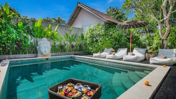 Outdoor pool, pool umbrellas, pool loungers