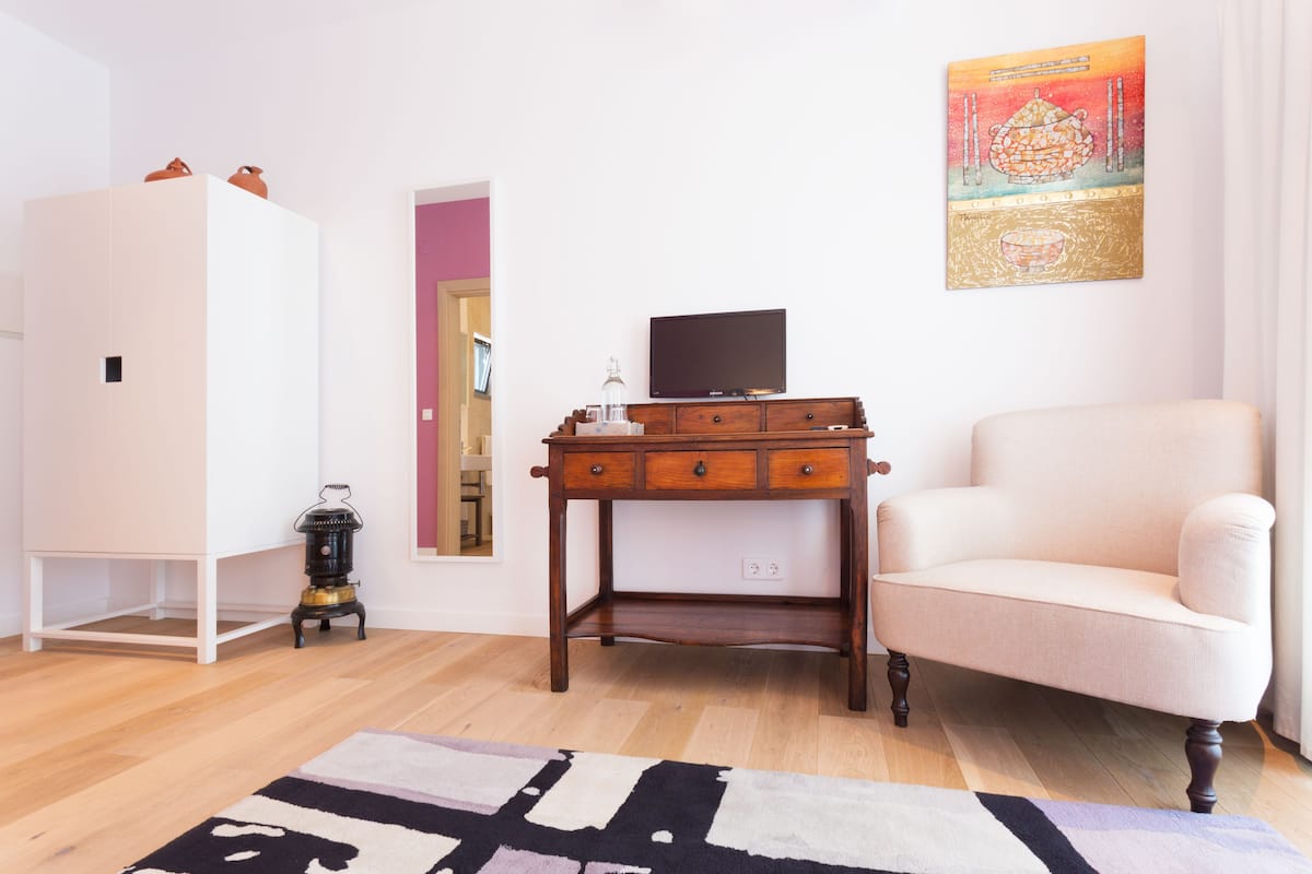 Double Room | Desk, blackout drapes, iron/ironing board, bed sheets