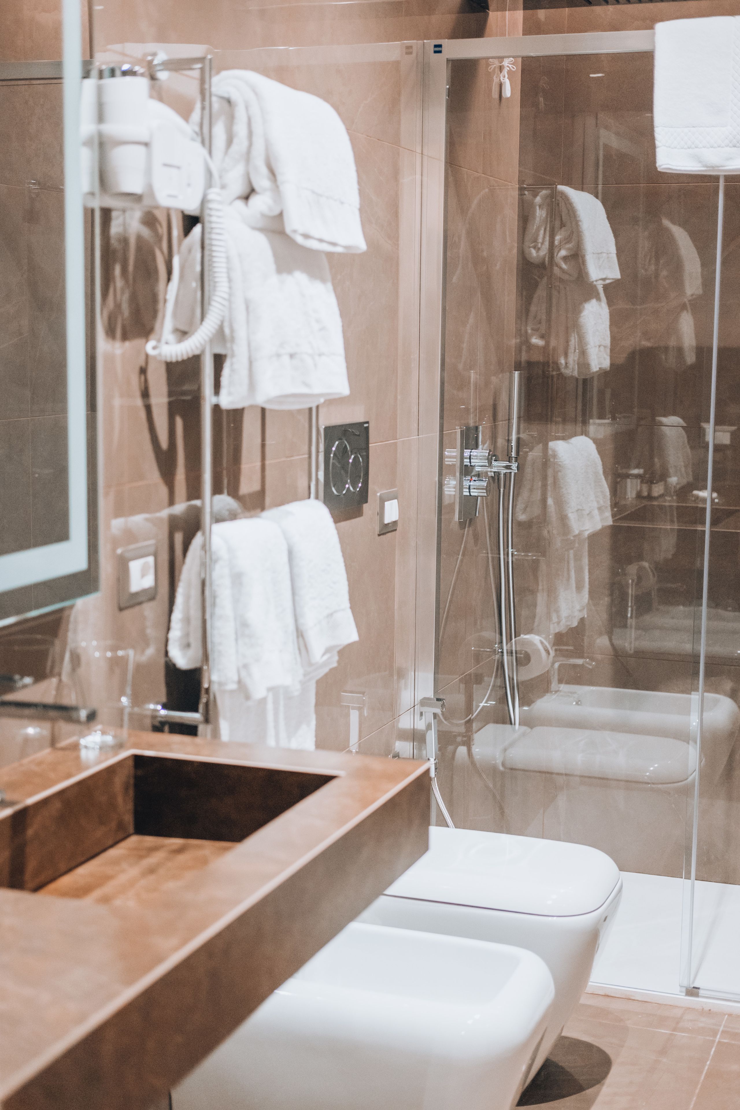 studio suite, 2 queen beds | bathroom | free toiletries, hair dryer, slippers, bidet