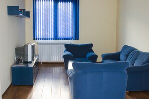 Apartamento, 1 quarto | Área de estar