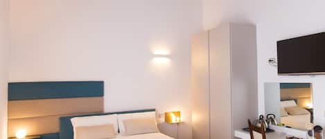 Traditional Triple Room, City View | Down duvets, memory-foam beds, minibar, in-room safe