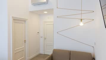 Chambre Double Exclusive, 1 grand lit et 1 canapé-lit | Coin séjour