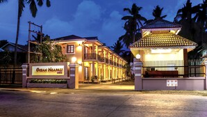 A hotel entrance with a sign reading "Ocean Ngapali Lodge." - Ocean Ngapali Lodge (Ngapali)