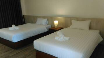 Habitación estándar con 2 camas individuales, 2 camas individuales | Cortinas blackout, camas extra y wifi gratis
