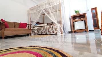 Deluxe-Vierbettzimmer | Hochwertige Bettwaren, Zimmersafe, kostenloses WLAN, Rollstuhlgeeignet
