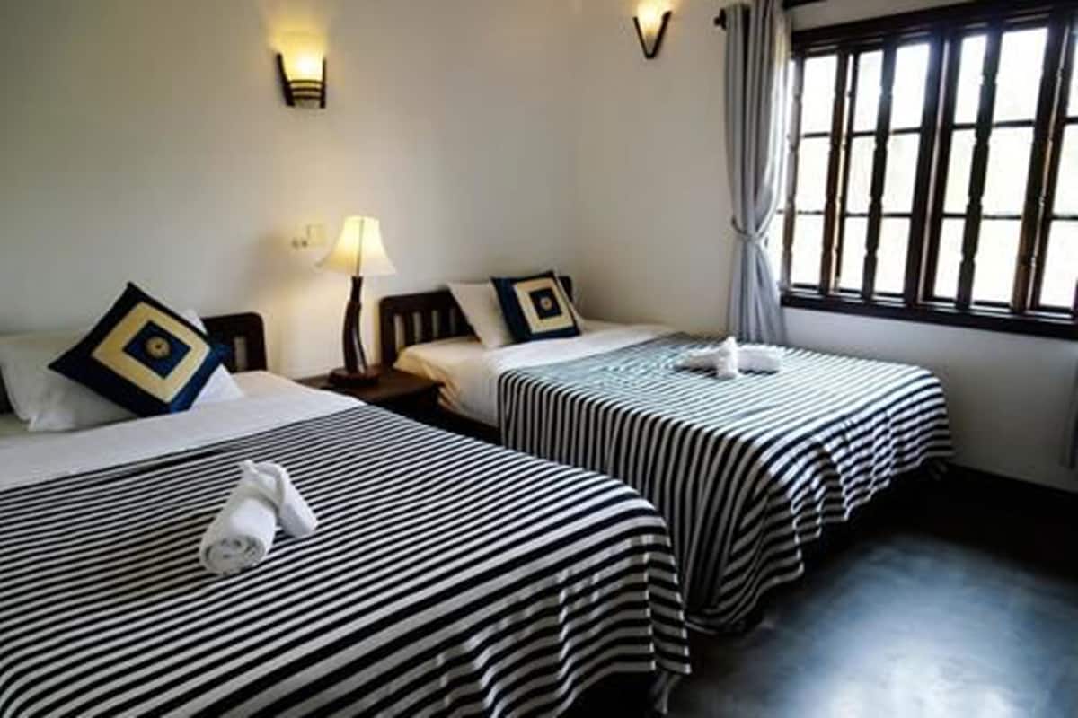 Kamar Twin Deluks | Minibar, meja kerja, Wi-Fi gratis, dan seprai linen